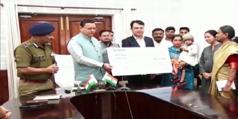 CM Dhami presented a check of 50 lakhs
