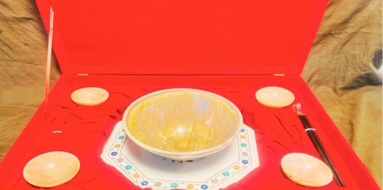 silver chopsticks, and ramen bowls