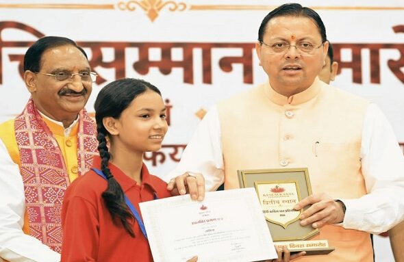 CM Dhami honored meritorious students